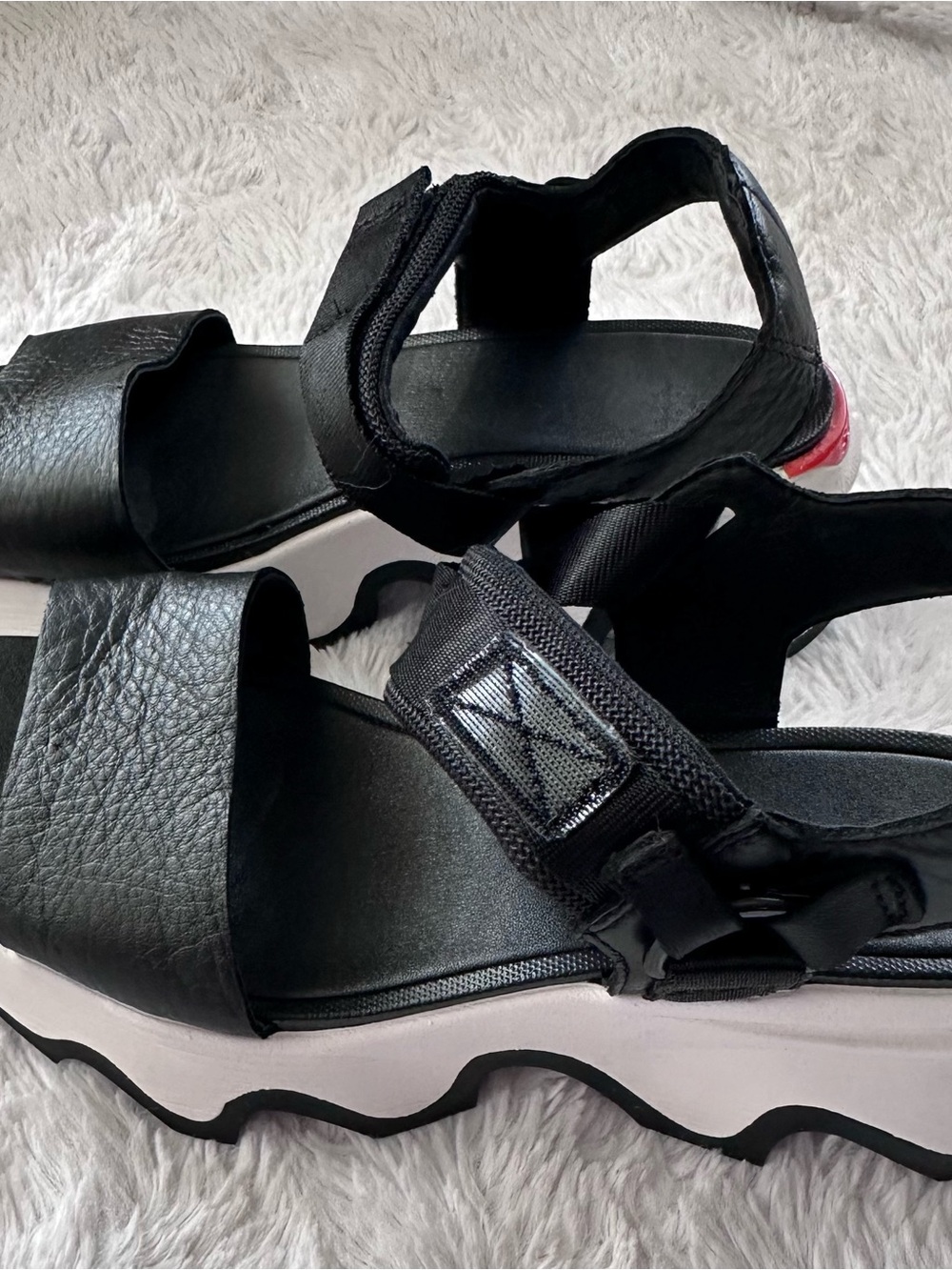 Sorel Black and White Platform Sandals with Red Heel Accent